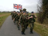 The team marching during a windy weekend